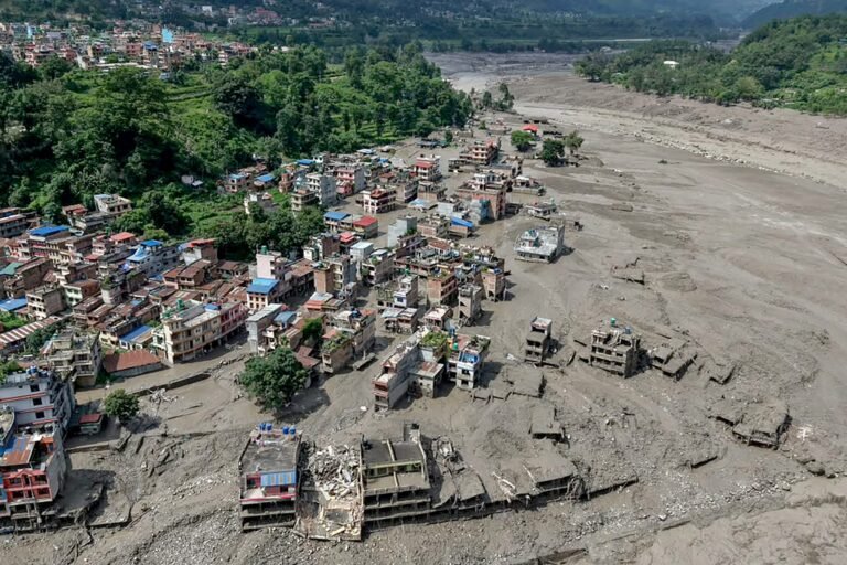 AFP__20260826__C6J89G4__v1__HighRes__NepalWeatherFlood-1-scaled